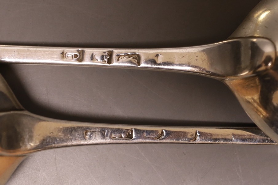 Three George III silver Onslow pattern basting spoons, two with pinched marks, one dated London, 1780, approx. 29.5cm, 10oz.